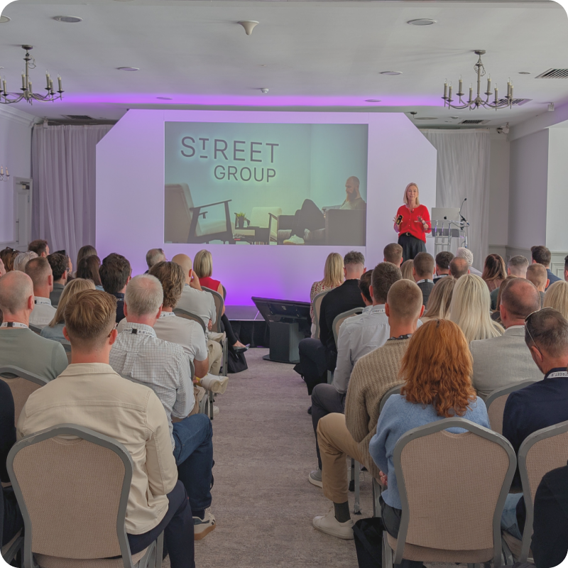 Street Roadshow event — agents networking and listening to presentations